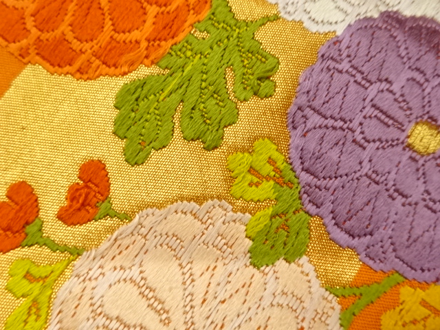  唐織秋草にヱ霞模様織出し袋帯